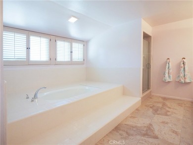 Situated on a quiet street overlooking a lush greenbelt in the - photo 21