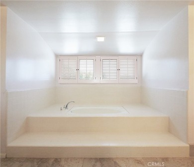 Situated on a quiet street overlooking a lush greenbelt in the - photo 22