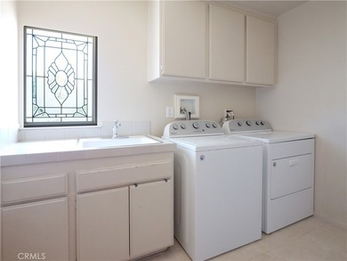 Situated on a quiet street overlooking a lush greenbelt in the - photo 34