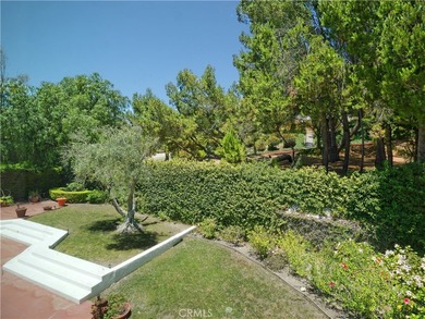 Situated on a quiet street overlooking a lush greenbelt in the - photo 37