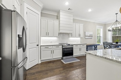 Charming cottage-style home in the sought-after Cuscowilla at - photo 9