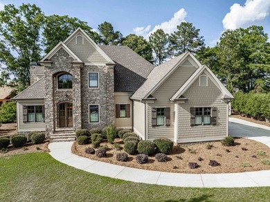 Enjoy breathtaking main lake views from this charming custom - photo 1