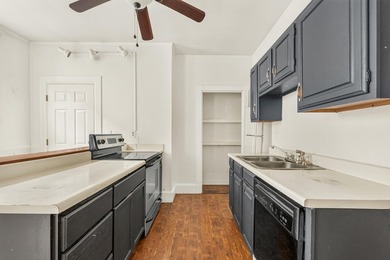 Welcome home to this inviting two-bedroom, 1.5-bath condo that - photo 9