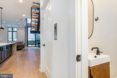 Introducing a rare, newly constructed luxury townhome discreetly