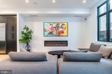 Introducing a rare, newly constructed luxury townhome discreetly