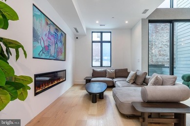 Introducing a rare, newly constructed luxury townhome discreetly