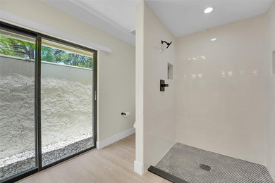 An exceptionally remodeled 2 bedroom 2 bathroom villa in the - photo 17