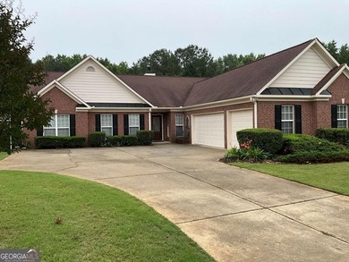 Welcoming large ranch home with 3 car garage in well established - photo 1