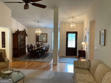 Welcoming large ranch home with 3 car garage in well established - photo 3
