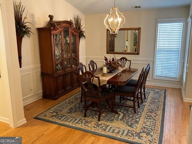 Welcoming large ranch home with 3 car garage in well established - photo 6