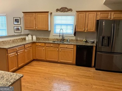 Welcoming large ranch home with 3 car garage in well established - photo 8