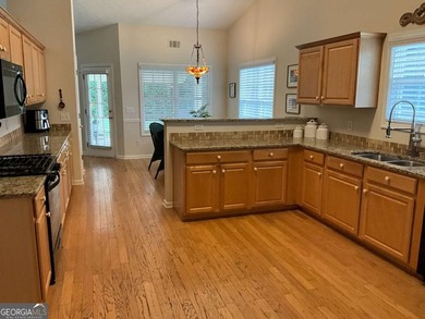 Welcoming large ranch home with 3 car garage in well established - photo 9
