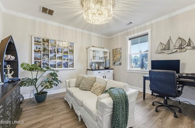 Beautifully set on a private, wooded lot in the sought-after - photo 11