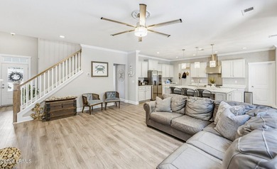 Beautifully set on a private, wooded lot in the sought-after - photo 13
