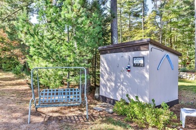 Tucked along the shores of beautiful Rest Lake on the coveted - photo 17