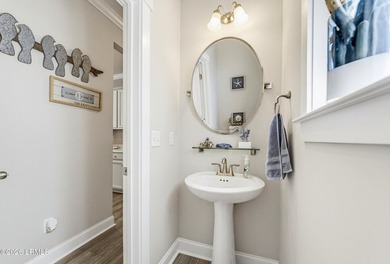 Beautifully set on a private, wooded lot in the sought-after - photo 18