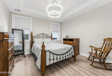 Beautifully set on a private, wooded lot in the sought-after - photo 19