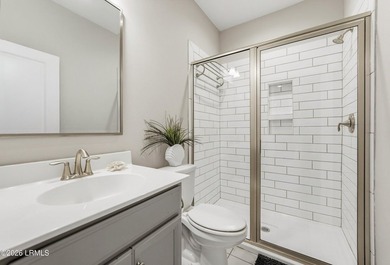 Beautifully set on a private, wooded lot in the sought-after - photo 20