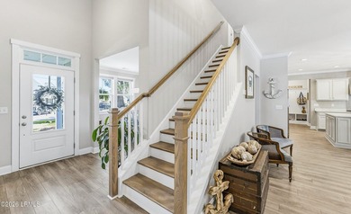 Beautifully set on a private, wooded lot in the sought-after - photo 21