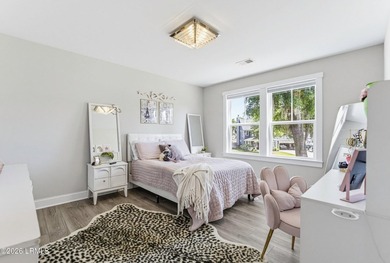 Beautifully set on a private, wooded lot in the sought-after - photo 23
