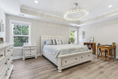 Beautifully set on a private, wooded lot in the sought-after - photo 26