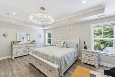 Beautifully set on a private, wooded lot in the sought-after - photo 27