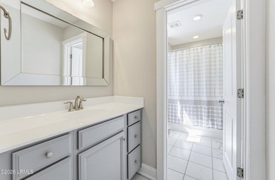 Beautifully set on a private, wooded lot in the sought-after - photo 32