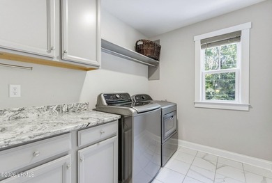Beautifully set on a private, wooded lot in the sought-after - photo 35
