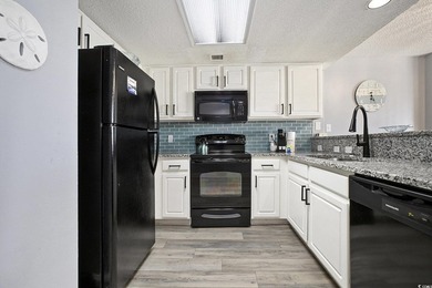 Welcome to this stunning 3-bedroom, 2-bathroom ocean-view condo - photo 11