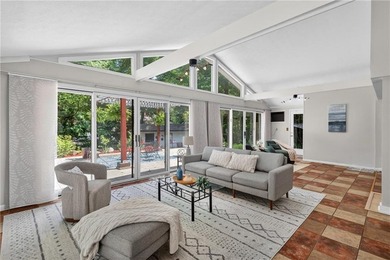 Tucked among mature trees on a large private lot in the - photo 11