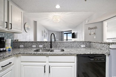 Welcome to this stunning 3-bedroom, 2-bathroom ocean-view condo - photo 12