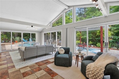 Tucked among mature trees on a large private lot in the - photo 12