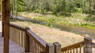 RIVERFRONT LOG HOME IN LAKE LURE, NC. Built in 2022, this 3358 - photo 14