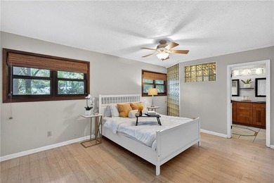 Tucked among mature trees on a large private lot in the - photo 15