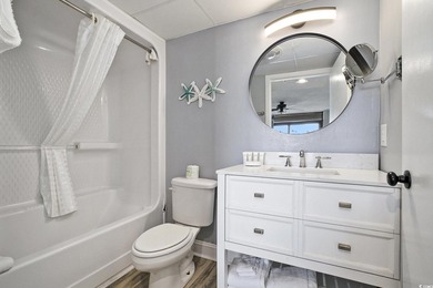 Welcome to this stunning 3-bedroom, 2-bathroom ocean-view condo - photo 18