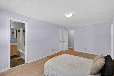 Tucked among mature trees on a large private lot in the - photo 18