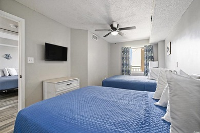 Welcome to this stunning 3-bedroom, 2-bathroom ocean-view condo - photo 21