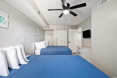 Welcome to this stunning 3-bedroom, 2-bathroom ocean-view condo - photo 22