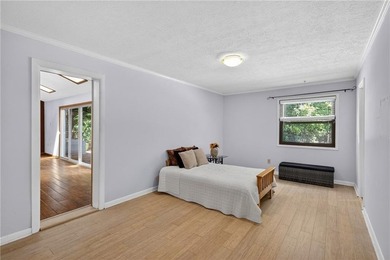 Tucked among mature trees on a large private lot in the - photo 22