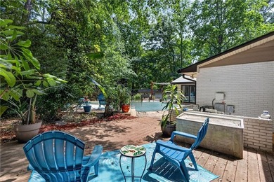 Tucked among mature trees on a large private lot in the - photo 24