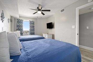 Welcome to this stunning 3-bedroom, 2-bathroom ocean-view condo - photo 25