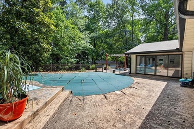 Tucked among mature trees on a large private lot in the - photo 25