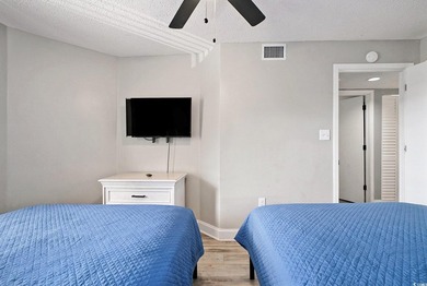 Welcome to this stunning 3-bedroom, 2-bathroom ocean-view condo - photo 27