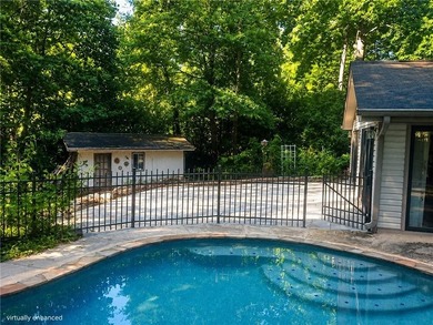 Tucked among mature trees on a large private lot in the - photo 28