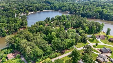Tucked among mature trees on a large private lot in the - photo 31