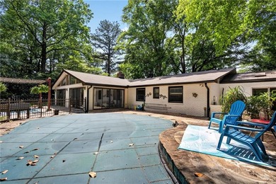 Tucked among mature trees on a large private lot in the - photo 32