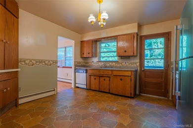 Welcome to 18 Sheryl Lane, a spacious raised ranch nestled on a - photo 11