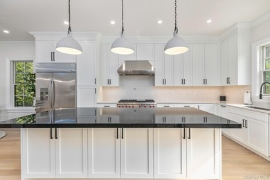 Discover refined Hamptons living in this newly completed - photo 11