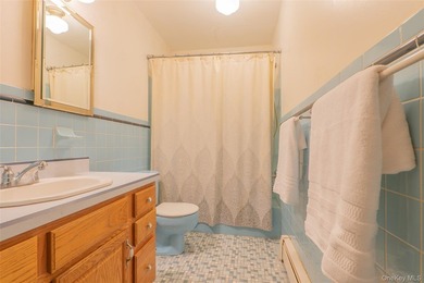 Welcome to 18 Sheryl Lane, a spacious raised ranch nestled on a - photo 14