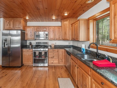Rare 222' of sandy frontage on Scattering Rice Lake on the - photo 18